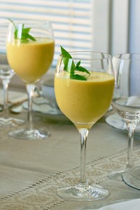 Tall glasses of mango smoothie