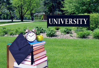 education concept with book and university campus