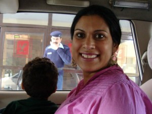 Picture of Krip in car leaving orphanage after her visit