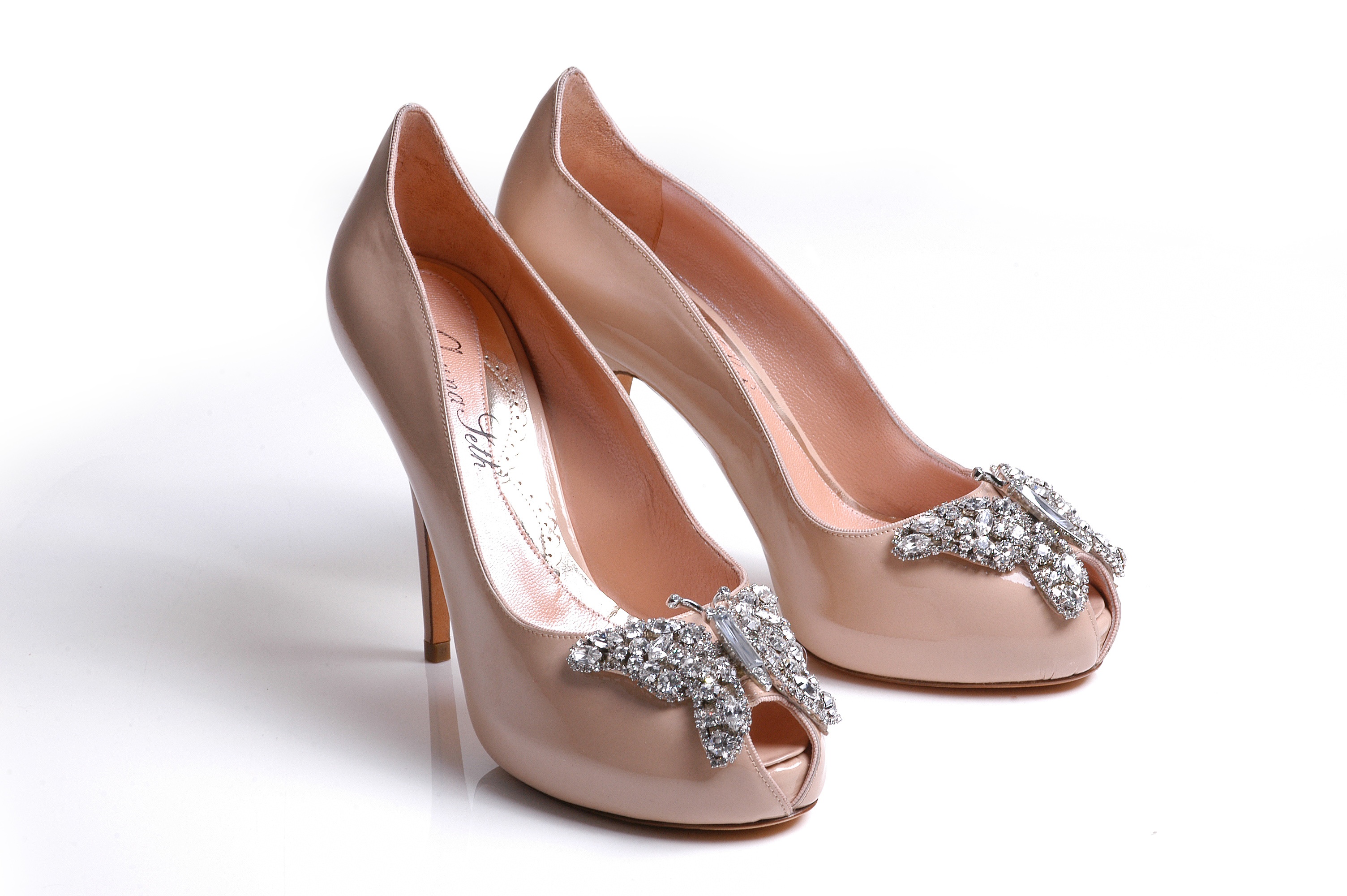 Nude patent farfalla shoes pair view