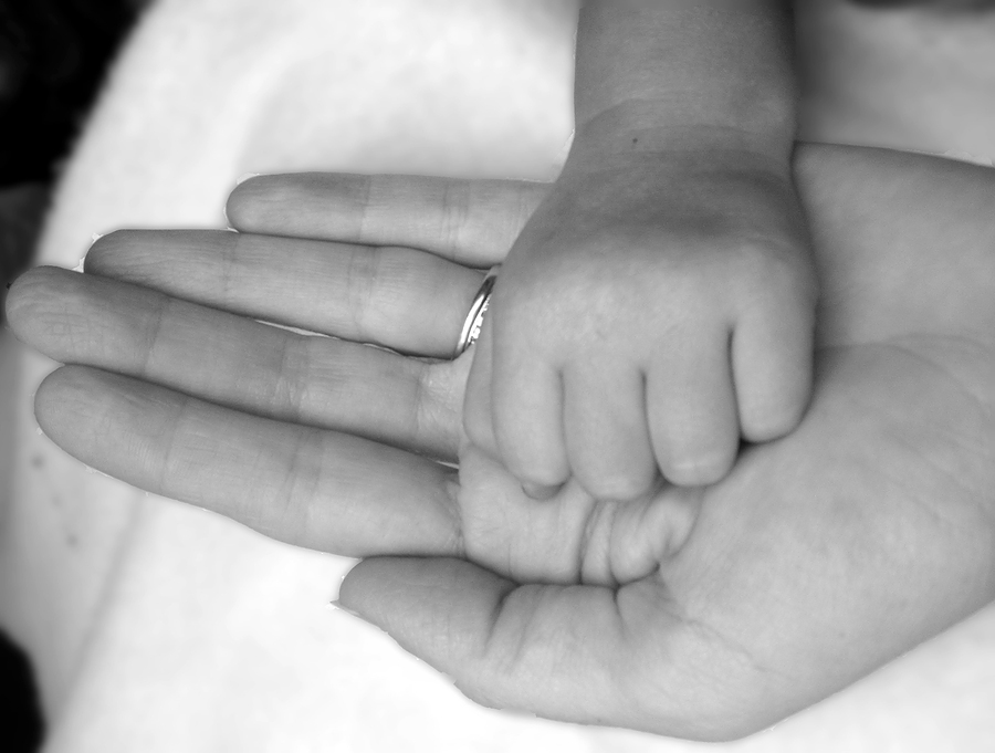 bigstock_Mom_and_Baby_Hands_763428