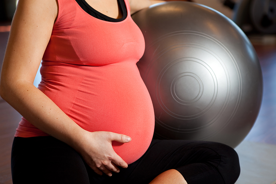 bigstock-Pregnant-Woman-Doing-Relaxatio-7814549