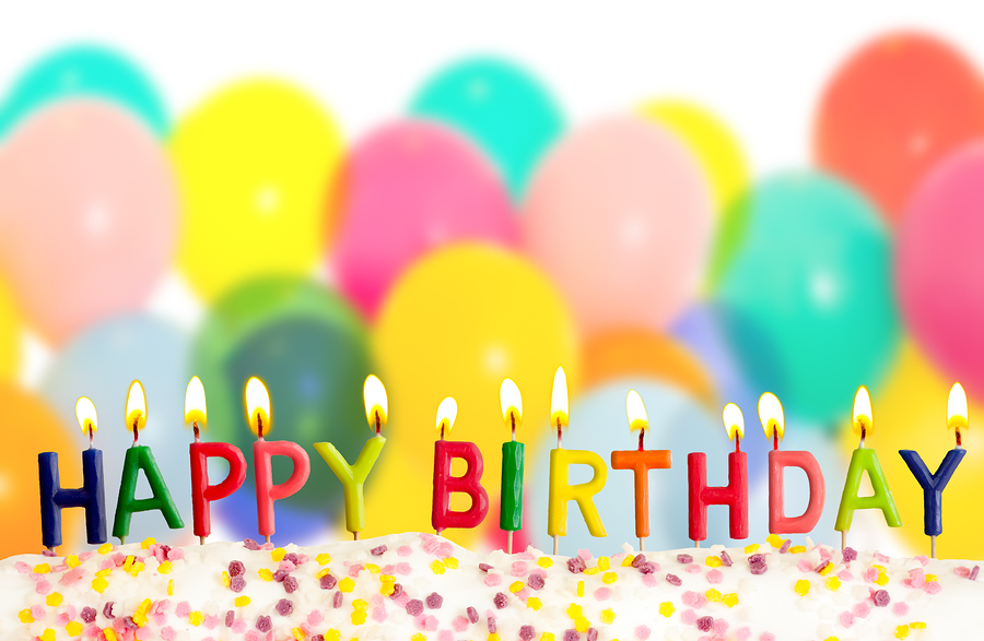 bigstock-Happy-birthday-lit-candles-on–31796636
