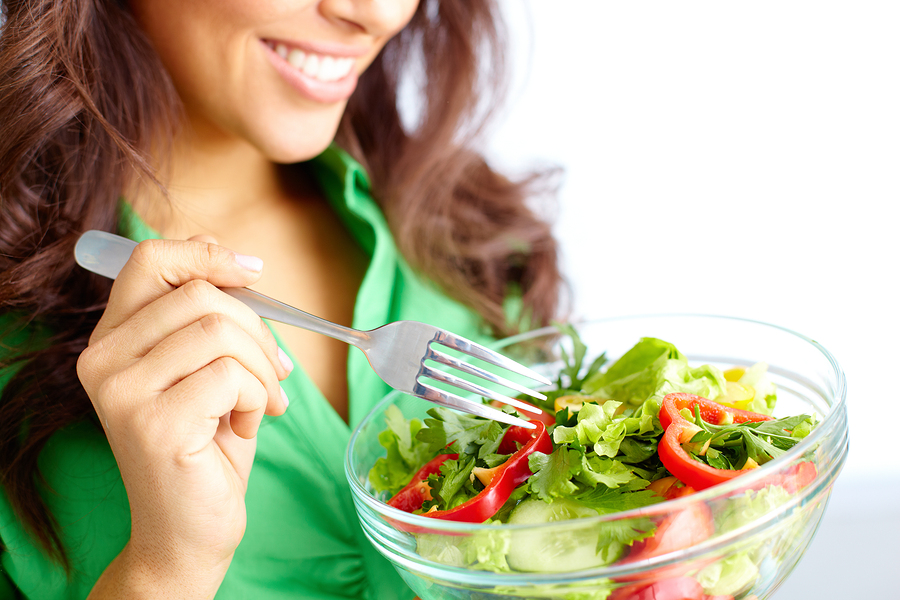 girl eating fresh vegetable diet salad